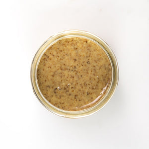 PB Love Co Smooth Almond Nut Butter open jar top view image.